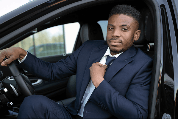 man in car